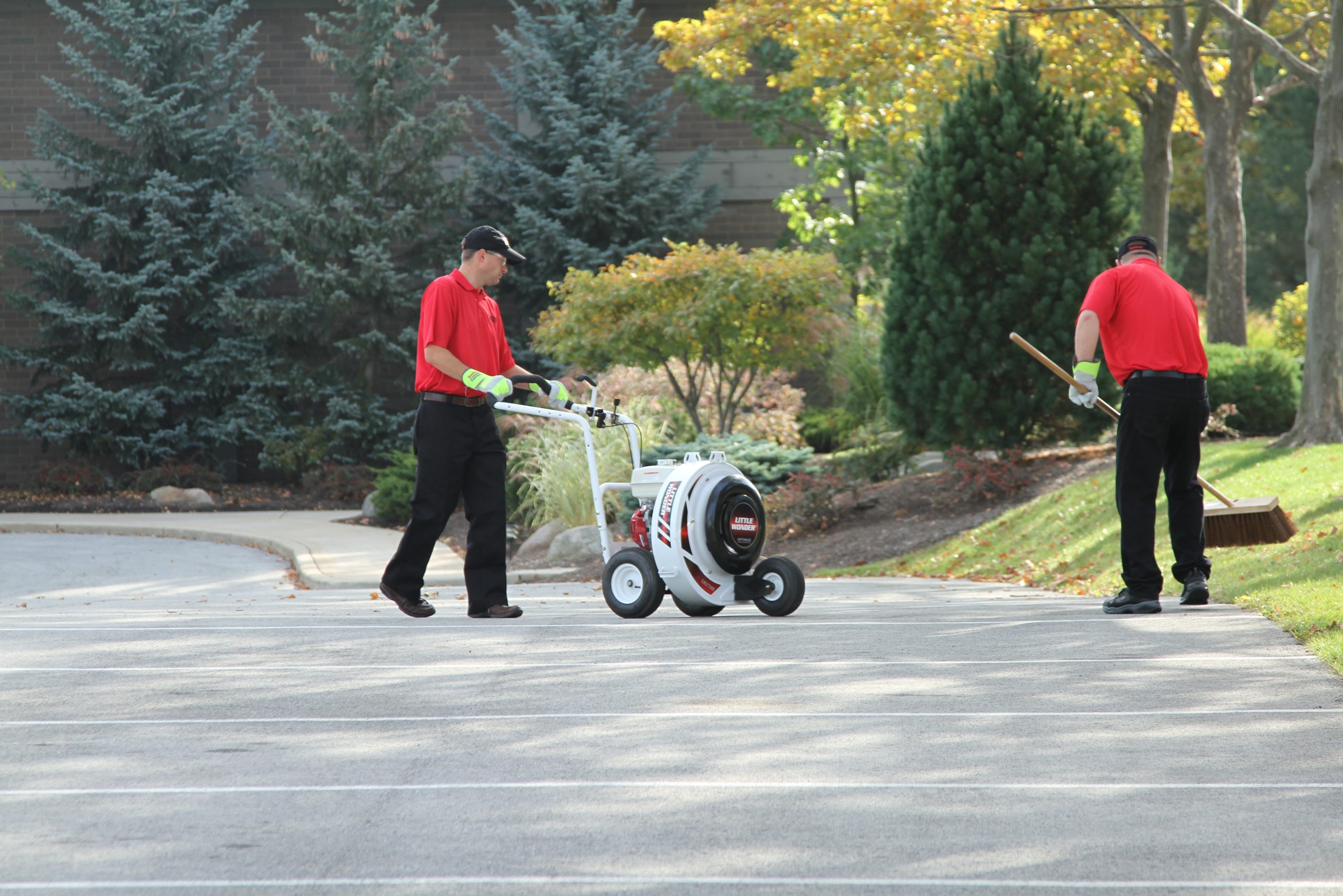 SealMaster equipment being used by sealcoating contractors before sealcoating a parking lot.