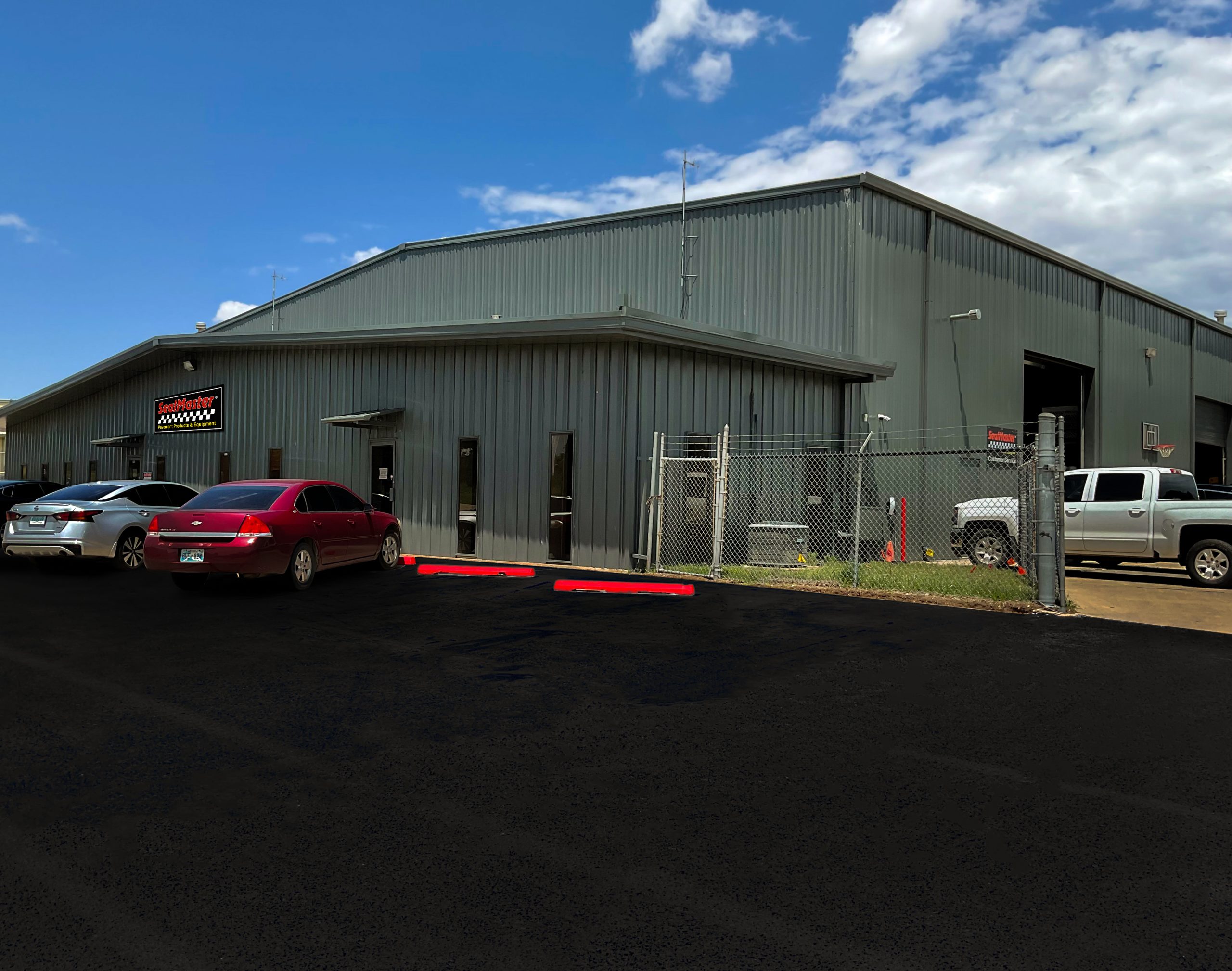 SealMaster storefront with freshly paved parking lot