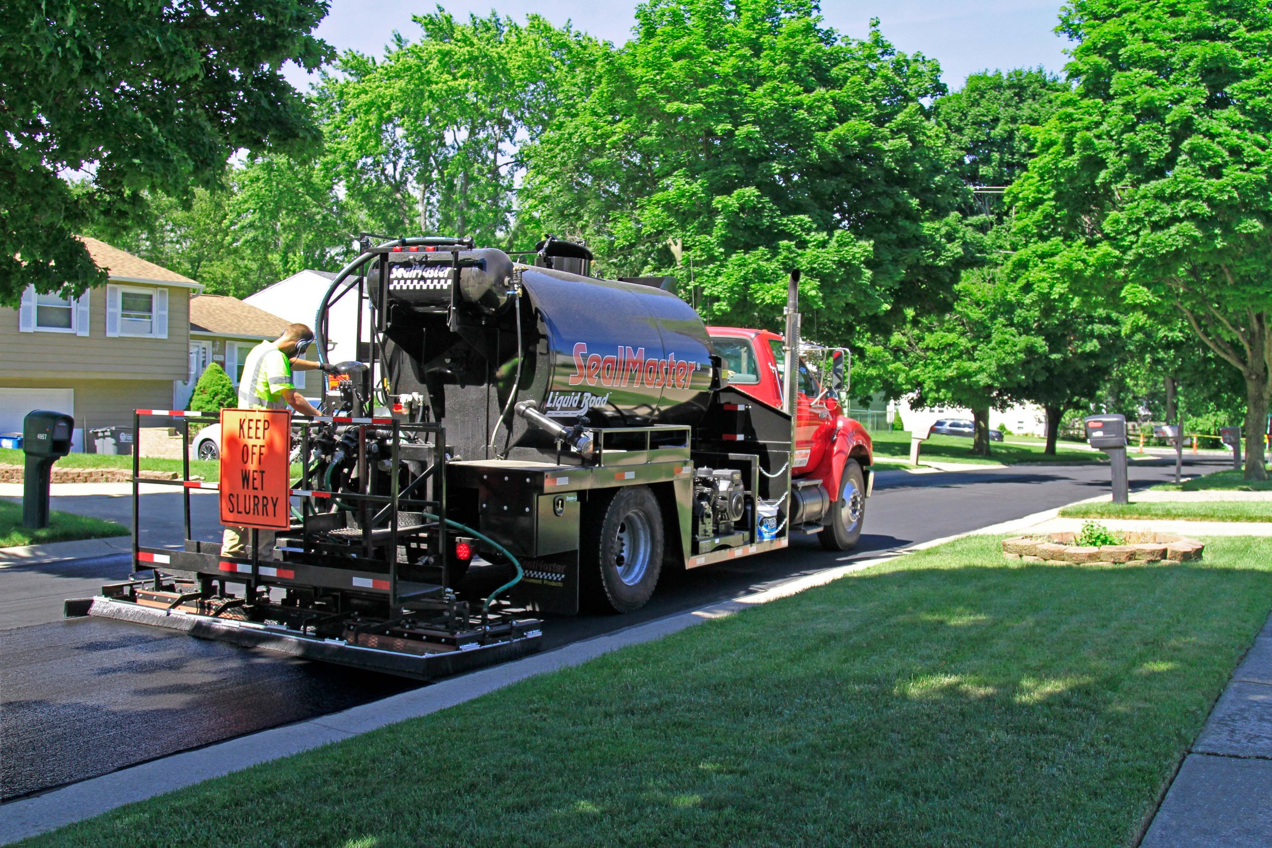 Liquid Road used to sealcoat a residential street in Toledo, OH by SealMaster / Local Sealcoating.