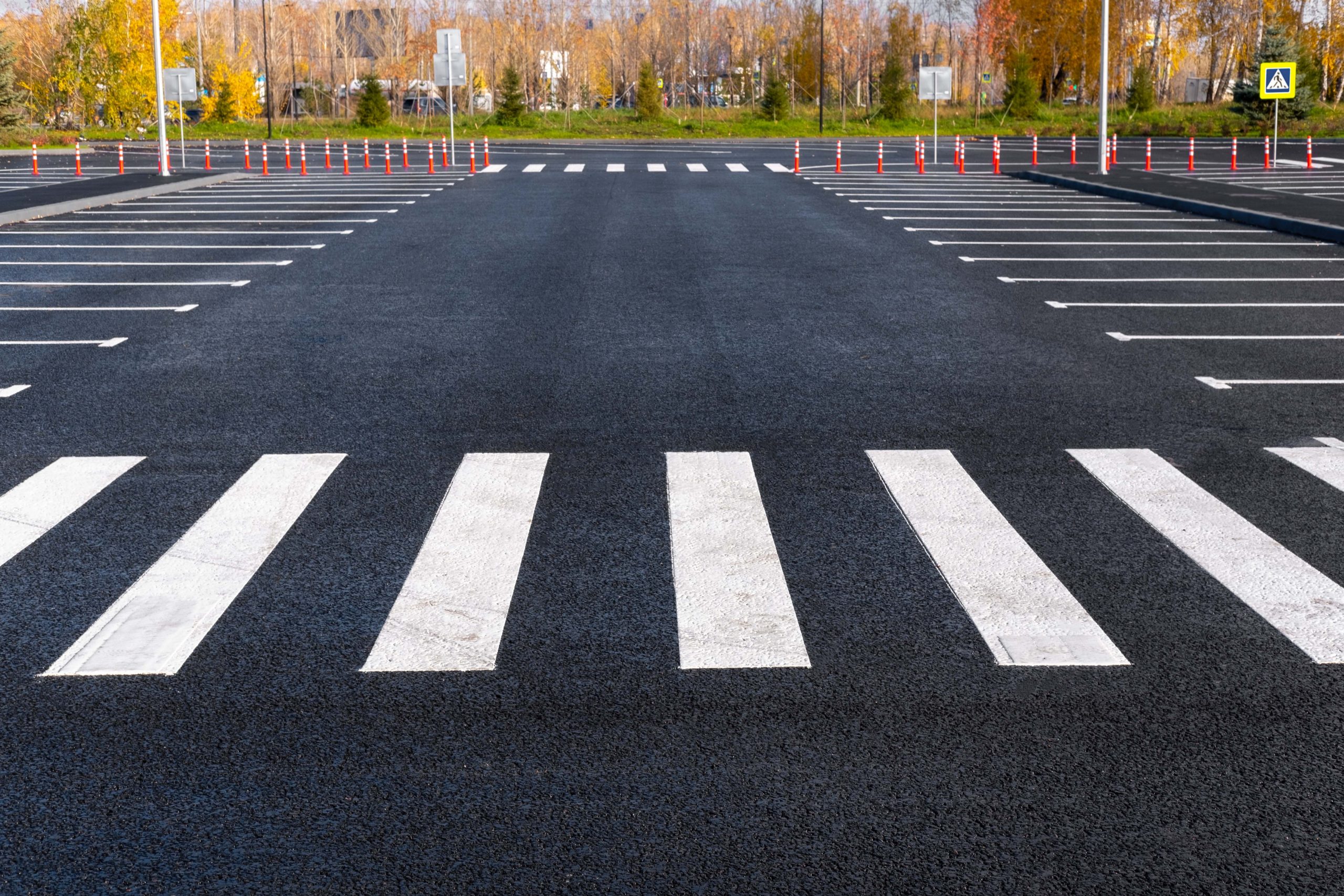 Freshly sealcoated and striped parking lot. Local Sealcoating SealMaster