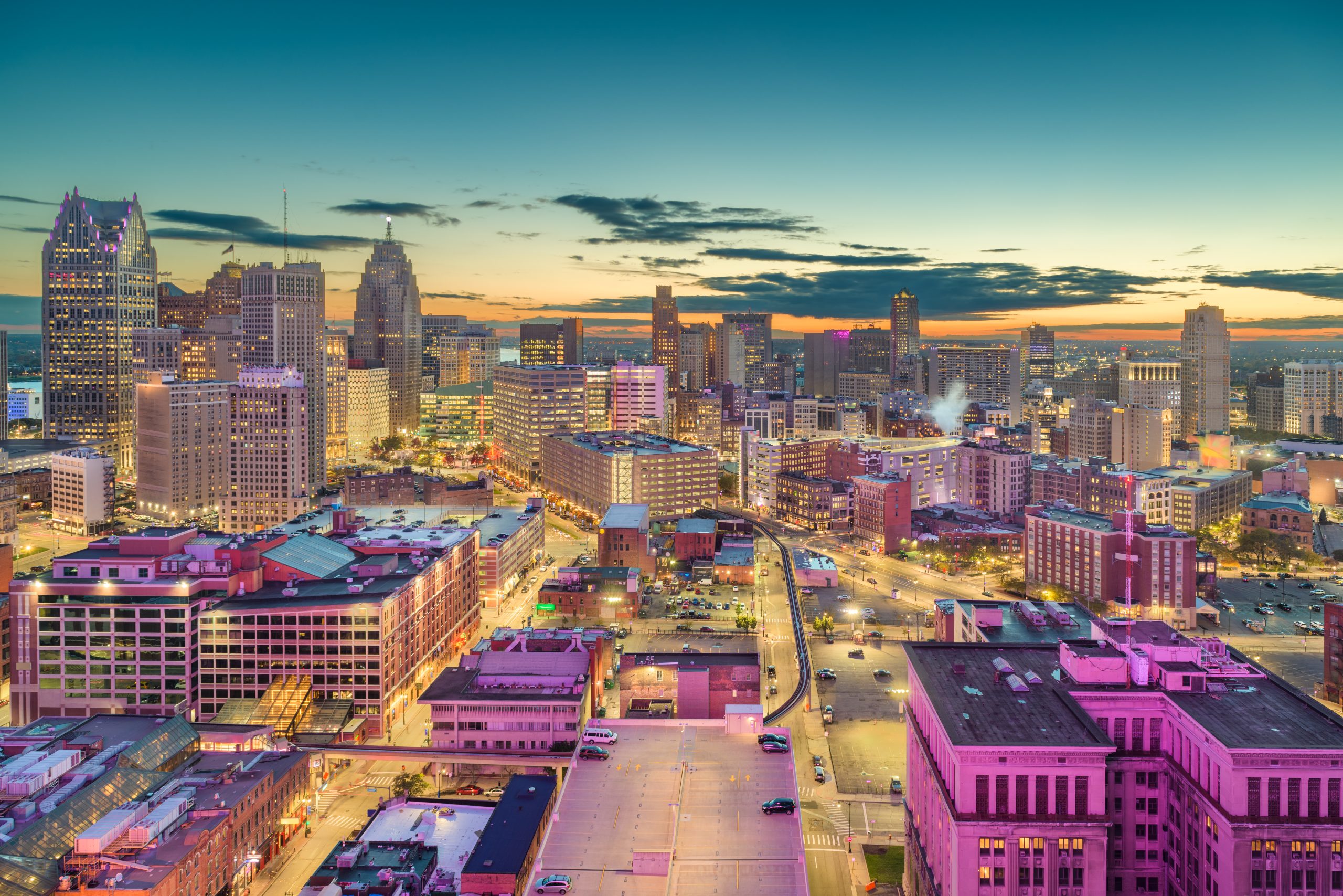 Detroit, Michigan, USA downtown skyline from above at dusk.