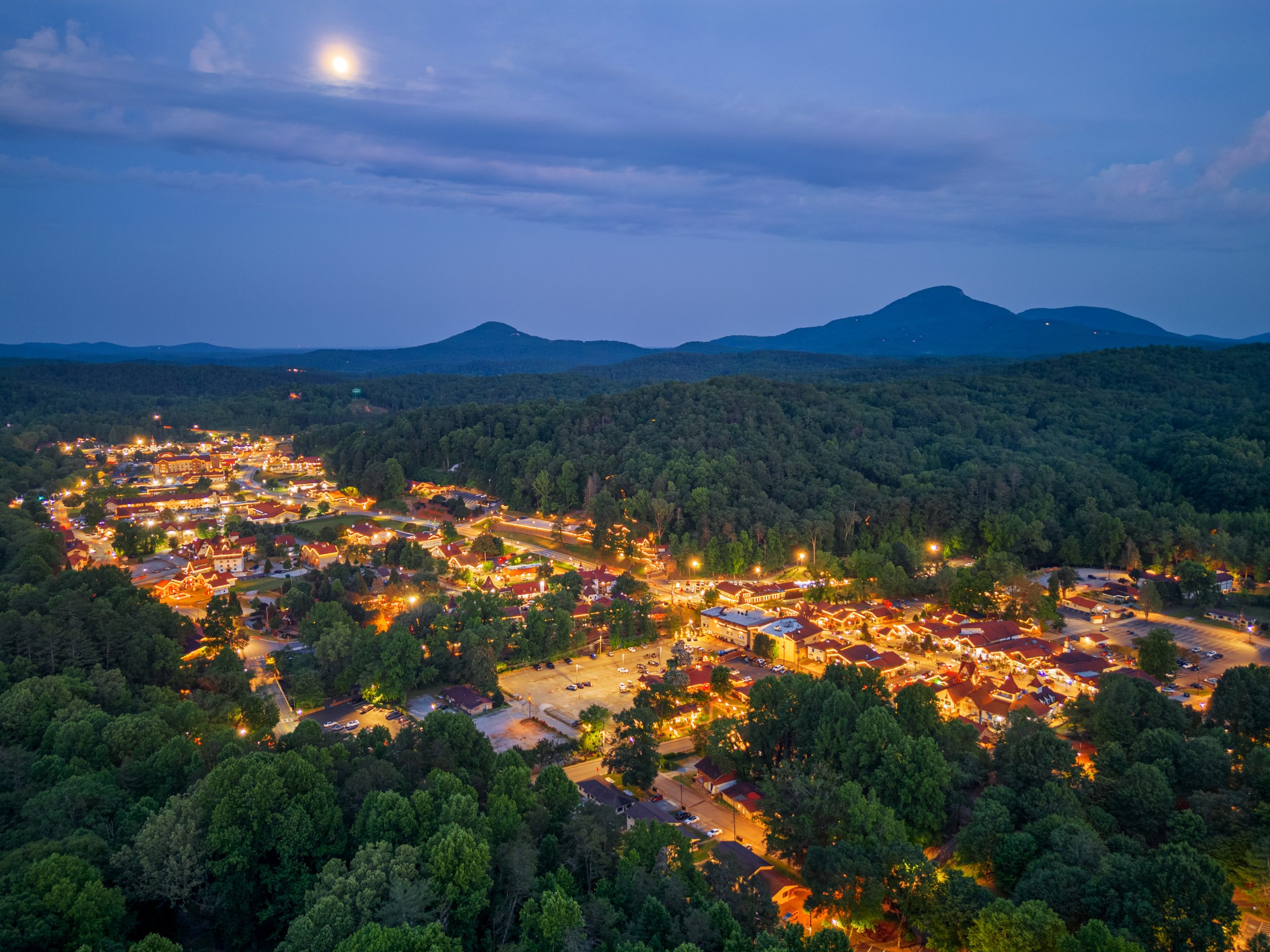 Helen, Georgia, USA downtown at night with Mt. Yonah in the distance.