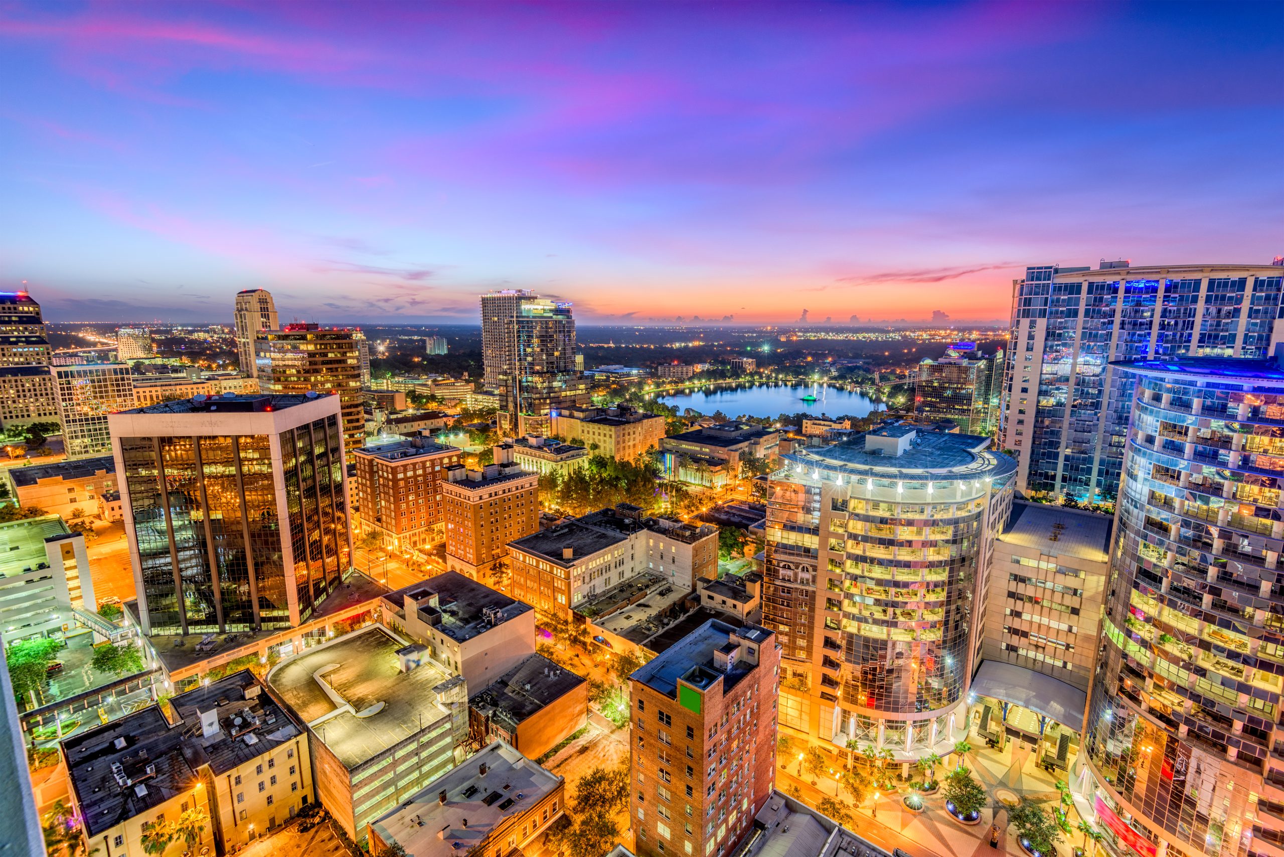 Orlando, Florida, USA aerial cityscape towards Eola Lake.