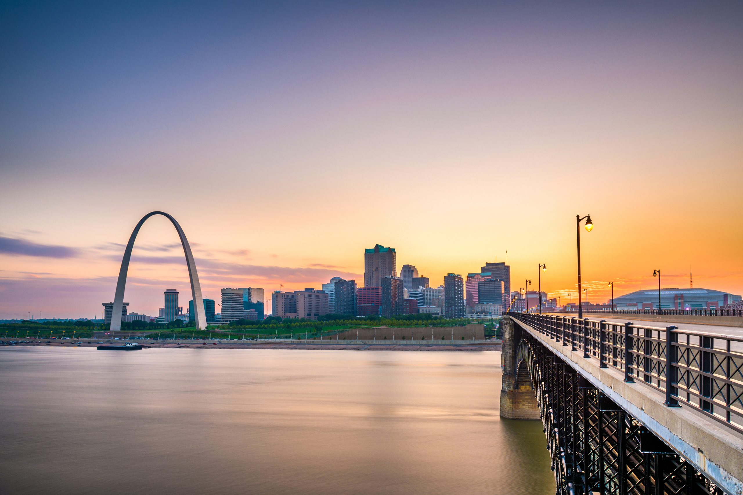 St. Louis, Missouri, USA downtown cityscape on the Mississippi River at twilight.